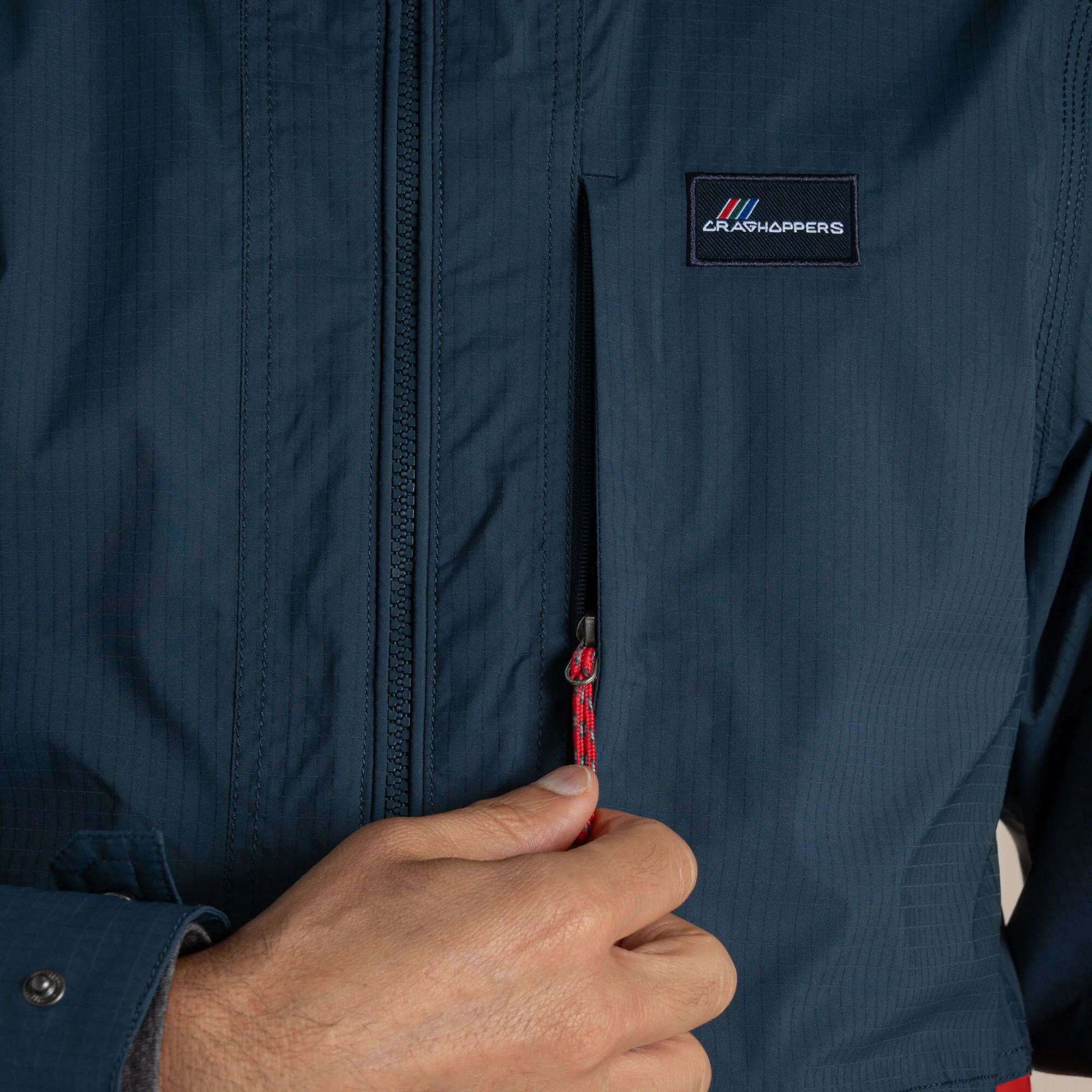 Craghoppers Men's Pandion Waterproof Jacket | Blue Stone / Pimento Red - Image 7